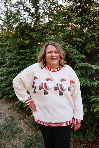 Skating Santa Sweater